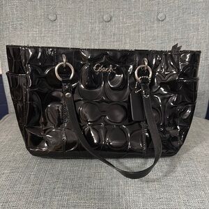 Coach Black Tote with Structured Design and Shiny Finish